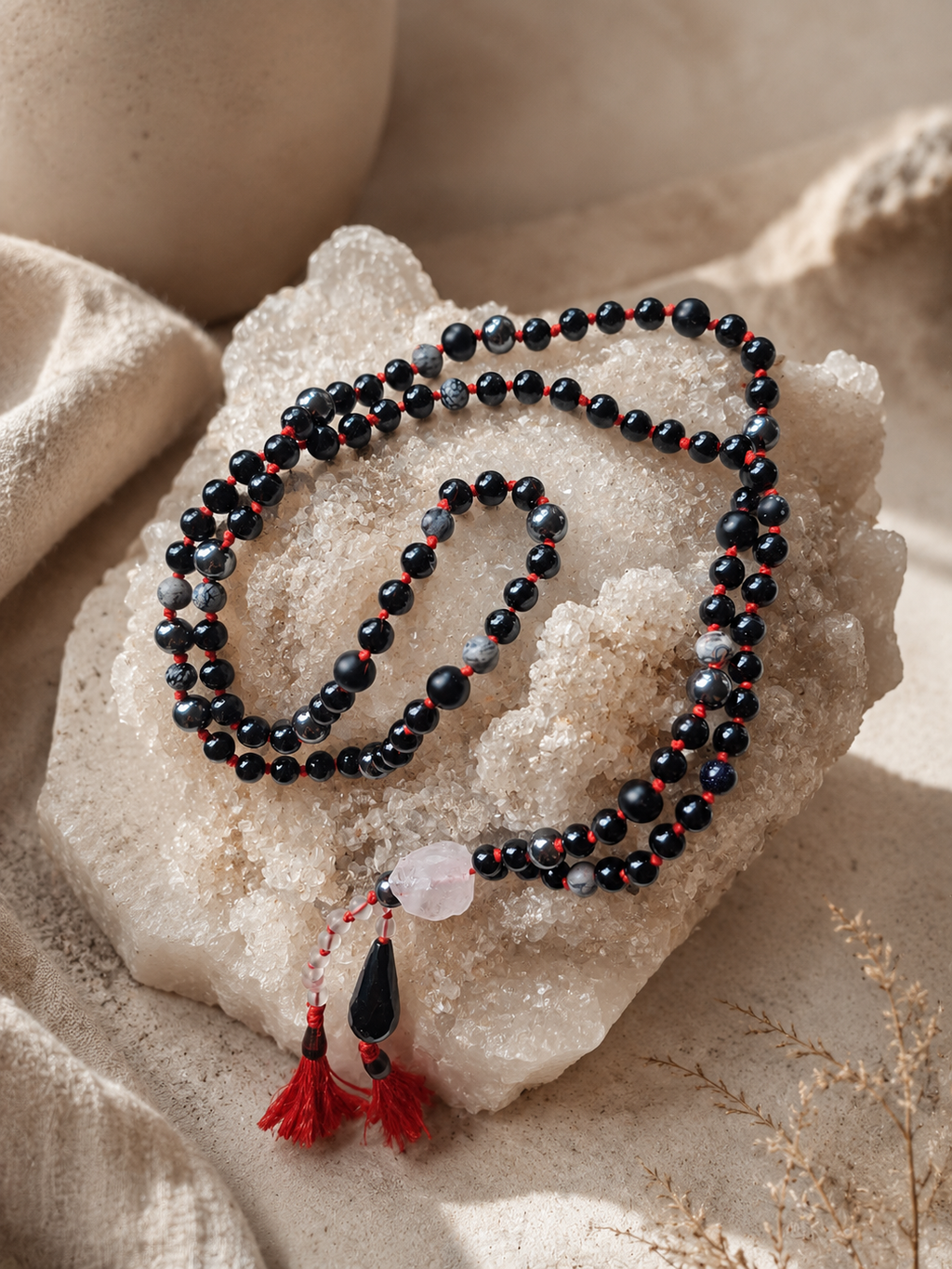 nocturne mala – full mala laid flat showing dark bead composition and double tassel ending