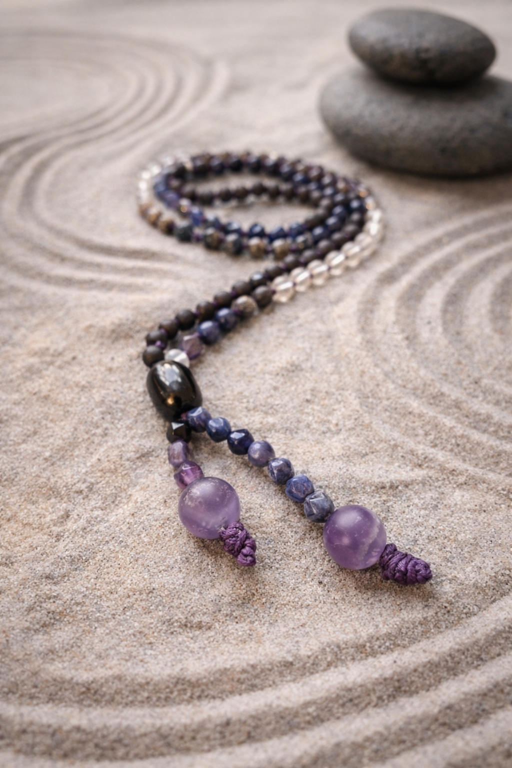 threshold mala — detail of faceted amethyst and sodalite ending beads